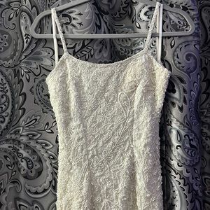 White House black market crème colored sequin open back dress